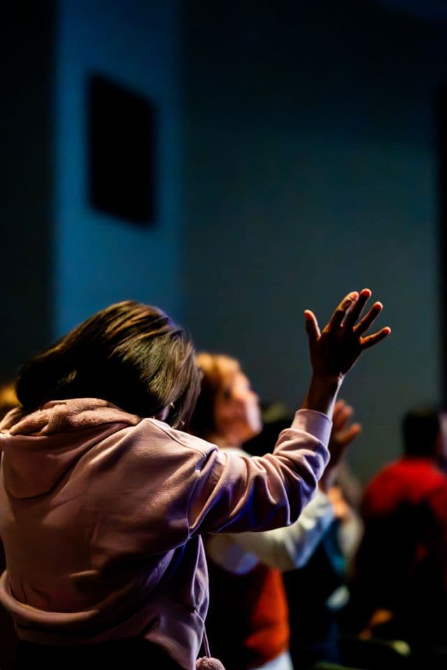 People worshipping during Sunday service.